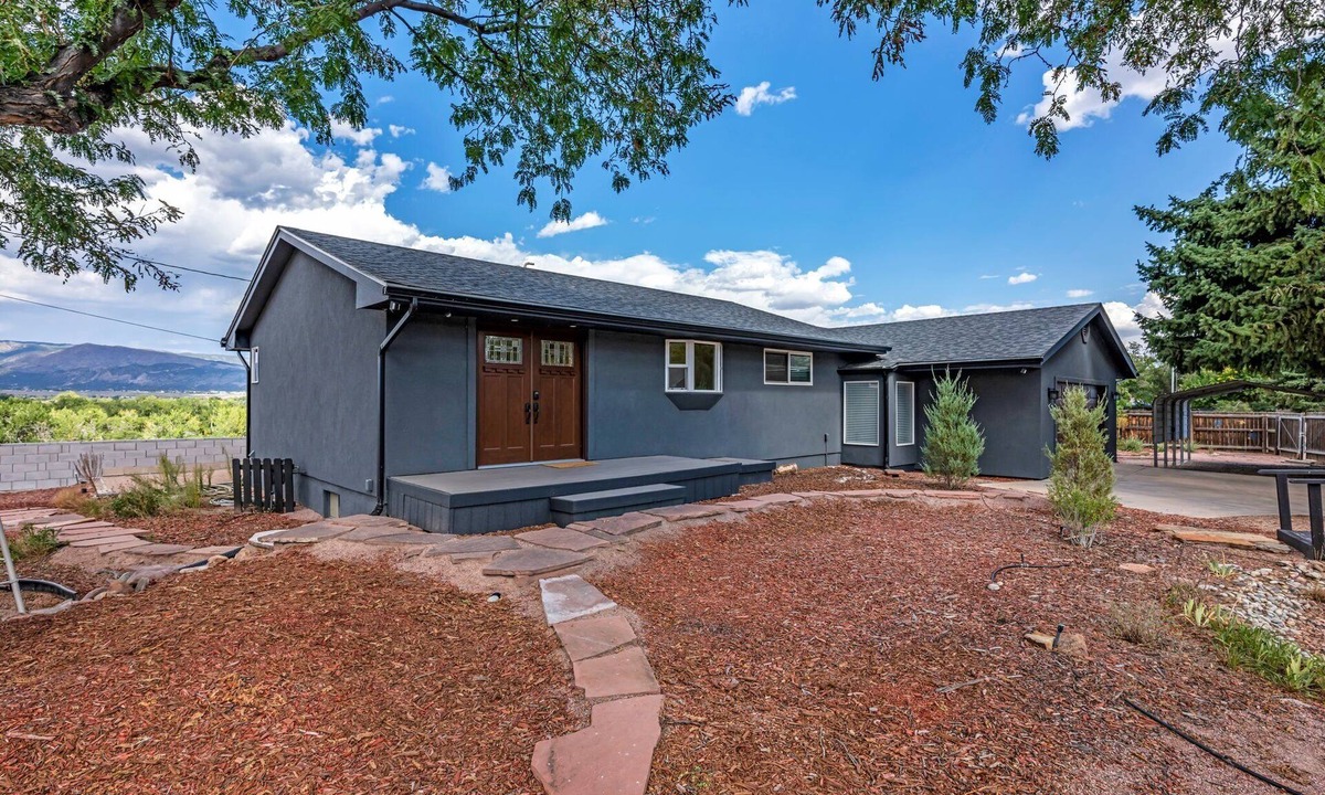 Canon City House | Beautiful home on the bluff overlooking river and mountain views with hot tub!