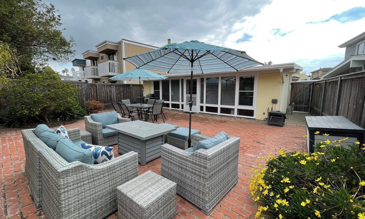 Pierpont Bay Cottage | Charming Beach Cottage Steps to the Sand Spacious Patio A/C
