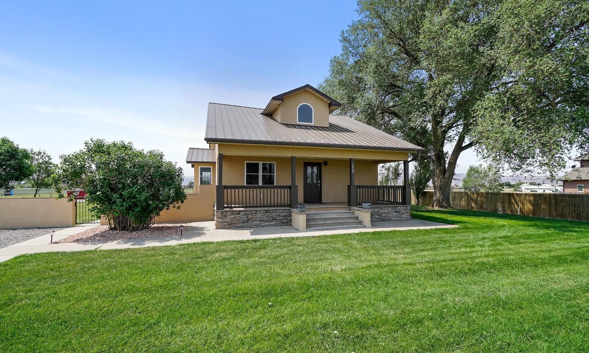Fruita House | Farmhouse: Luxe Living & Backyard Oasis
