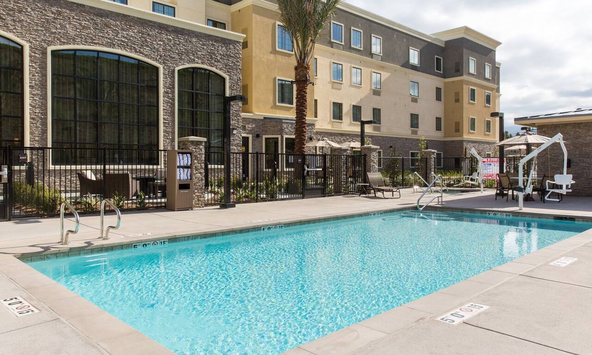 Corona Apartment | Free Breakfast. Pool & Hot Tub. Gym. Great for Business Travelers!
