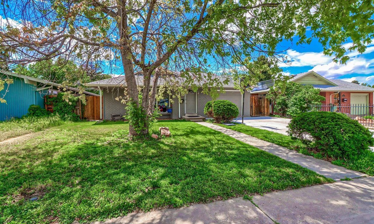 East Colfax House | Grey Brick Home Close to Central Park & Anschutz Medical Campus
