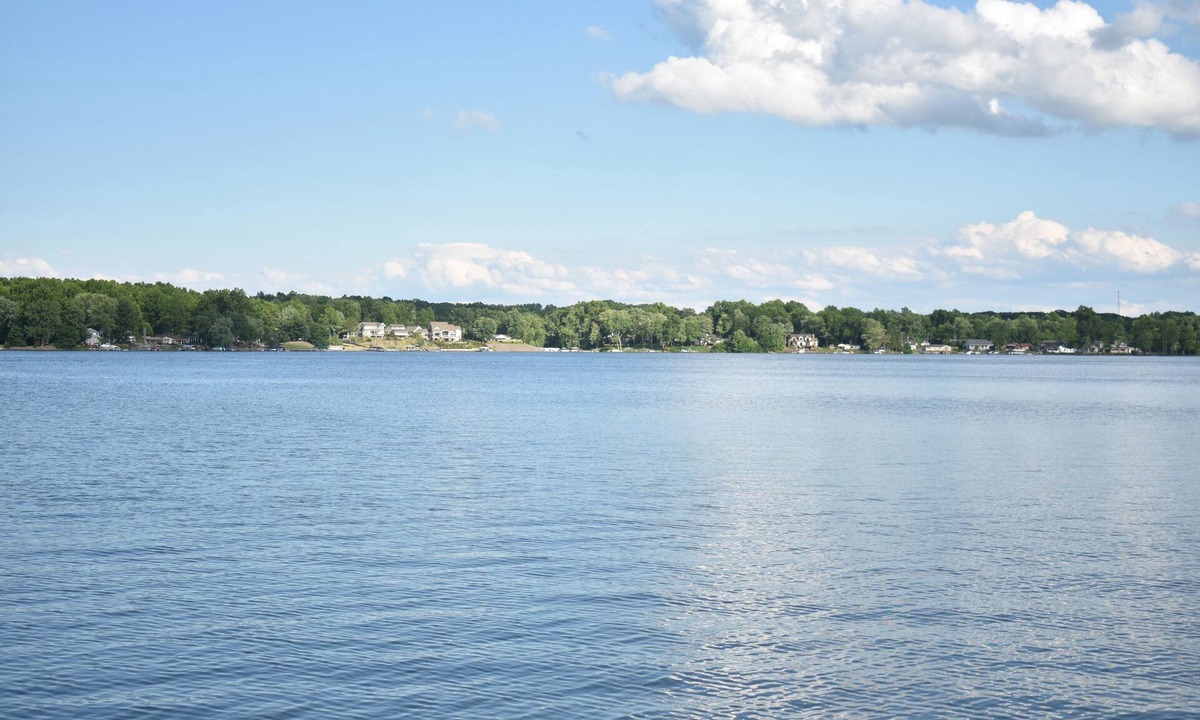 Craig Beach House | Lakeside living awaits at beautiful Lake Milton, OH with dock across the street