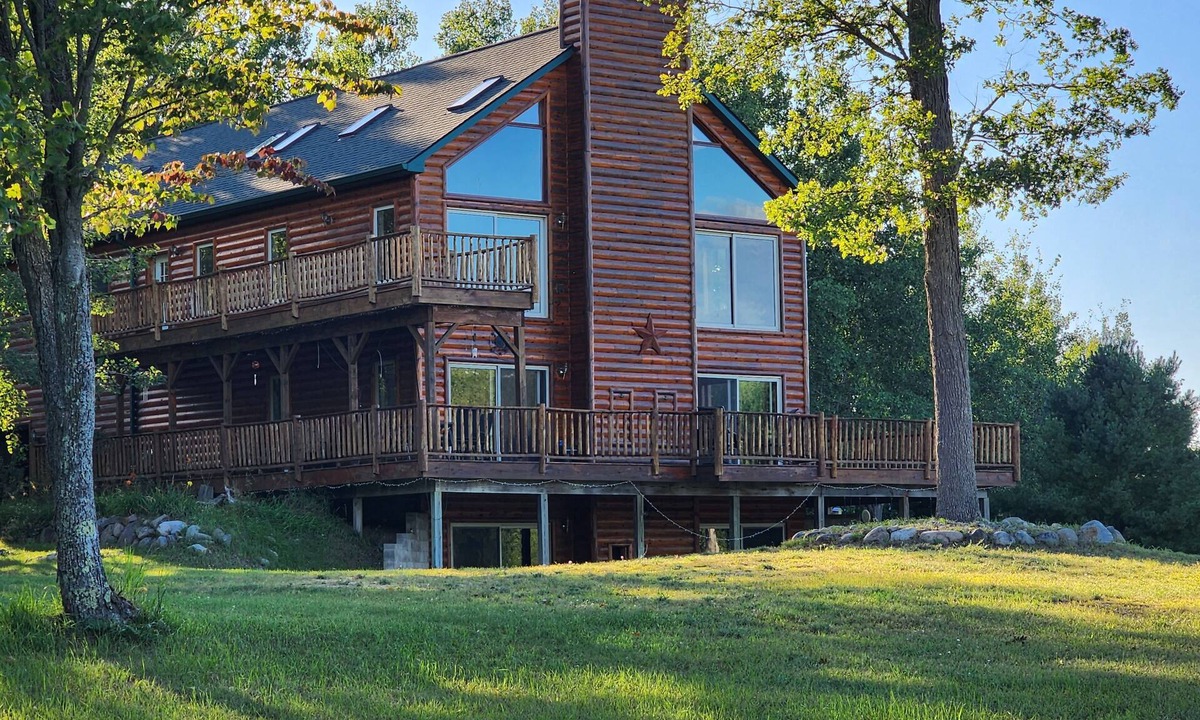 Comins Cabin | Private 50-Acre Northern MI Lodge. Walk to Golf & Fun Park. Trails Onsite