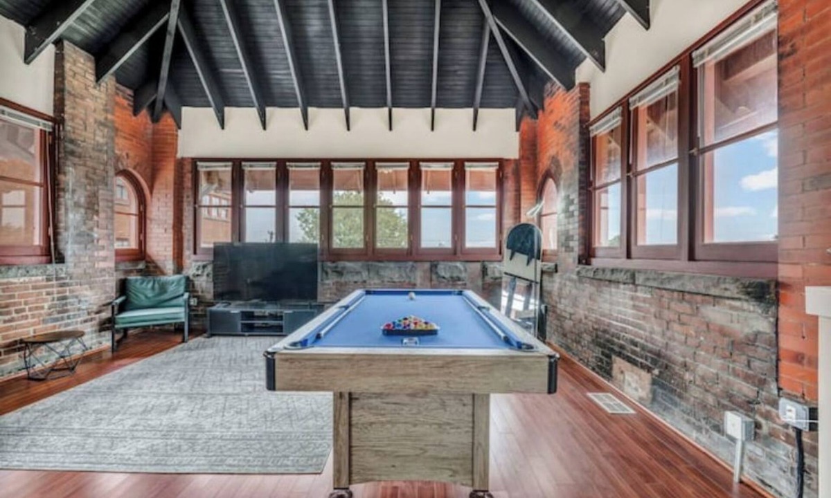 Tremont House | Urban Industrial Penthouse | Game Room Pool Table