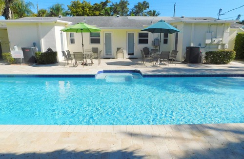 Royal Poinciana House | 3/3 Duplex for 6+Shared Heated Pool, Tiki Bar BBQ