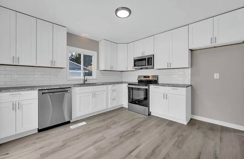Painesville House | 3-bedroom house in brilliant Painesville with AC and fitness room
