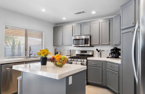 North Las Vegas House | 5BD Memorable Stays and Backyard Games Galore!