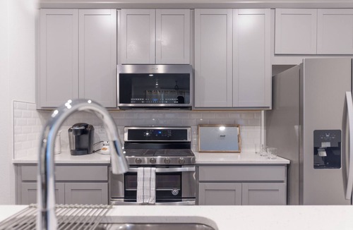 Aurora House | A cozy home near miles of trails, playgrounds, and 22 Acre Central Park.