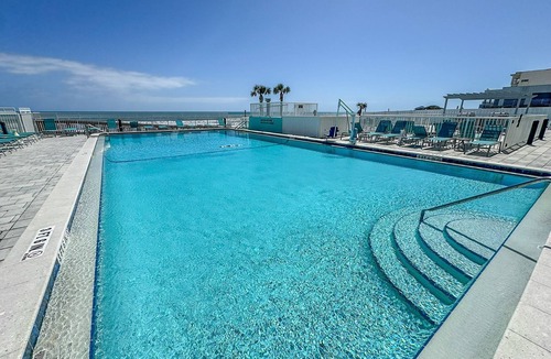 Bostroms Lower Ormond Beach Apartment | ADA Oceanfront Studio | Games, Pool & Picnic Area