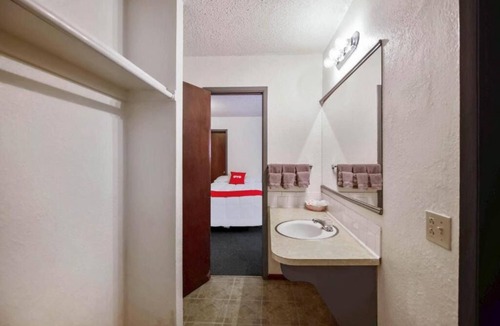 Cheyenne Wells Hotel | Affordable Queen Room Perfect for Eastern Colorado Road Trips
