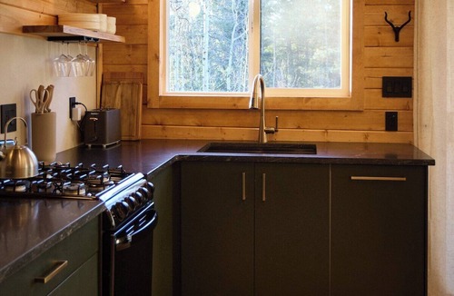 Florissant Cabin | Aspen Hideway · Mountain Modern log Cabin Deck + Hot Tub
