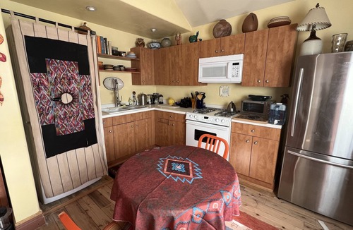 Abiquiu House | Awe inspiring views overlooking the Chama river valley, iconic Pedernal. Cozy.