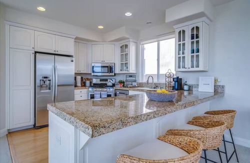 The Strand House | Beach Townhome with Ocean Views, Sleeps 6, Garage Parking Space