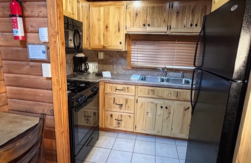Almont Cabin | Beautiful 2 Bedroom Cabin on Taylor River with Private Hot Tub