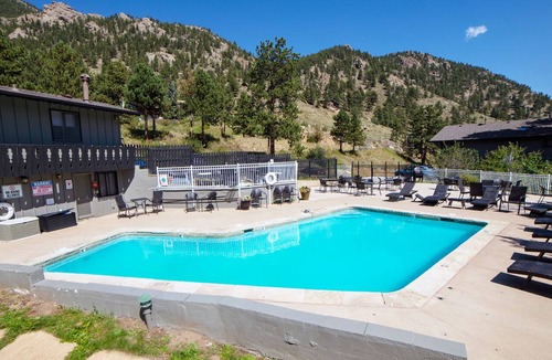 Estes Park Condo | Beautiful river and mountain views prevail from this 3-bedroom, 2-bath condo.