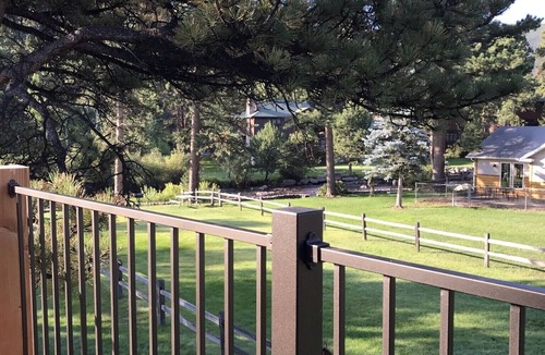 Estes Park House | Beautiful river home with large yard, sitting area and fire pit!