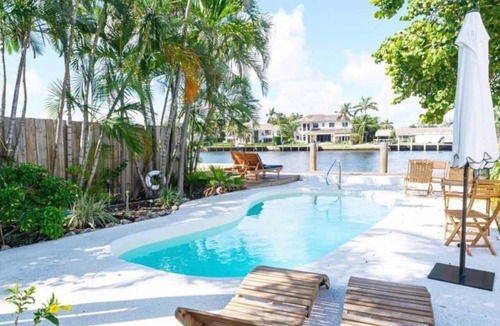 Santa Barbara Estates Condo | Beautiful Waterfront Condo on Canal with Pool & Walk to Beach! Boat Watch! 1b/1b