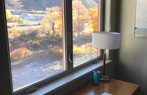 Salida Condo | Book NOW for Holidays and Skiing! Downtown Salida with 3 balconies on the River!