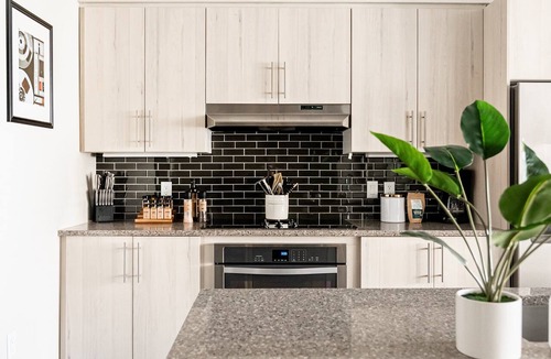 River North Art District Condo | Bright & Breezy | RiNo Loft with Custom Street Art | Dog-Friendly