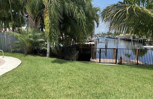 Garden Isles House | Canal home with pool and great sunset view!