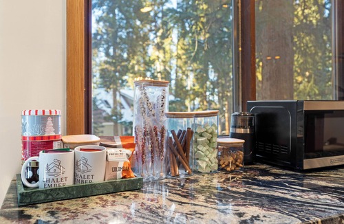 Blue River House | Chalet Ember is a luxury mountain retreat near Breckenridge designed for large groups. Enjoy a private sauna, outdoor hot tub, fire pit, and warm modern alpine interiors—perfect for ski trips, multi-family getaways, and year-round mountain escapes.