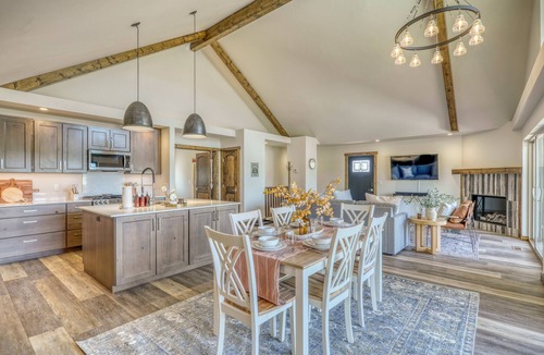 Pagosa Springs House | Cloud Cap Lake Home — a modern 3-bed, 2-bath retreat with a covered deck over serene lake views. Paddleboards, bikes, helmets & life jackets included.