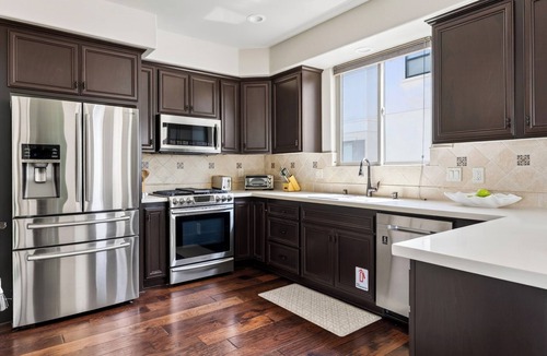 Downtown House | Coastal Luxury Living Rooftop Fire Pit + 2 Blocks from Beach | Stimson