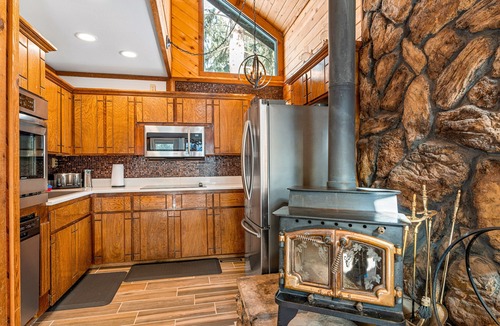 Bayfield Cabin | Comfortable Dog-Friendly Home within Walking Distance of Lake - Wooded Setting