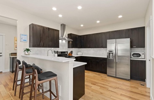 Old Town North House | Contemporary Gem - Rooftop Deck & Private Hot Tub!