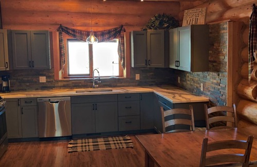 Innsbruck Val Moritz Cabin | Cozy Log Built Home in the Heart of Granby minutes from Granby Ranch Ski Resort.