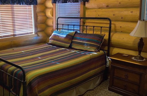 Innsbruck Val Moritz Cabin | Cozy Log Built Home in the Heart of Granby minutes from Granby Ranch Ski Resort.