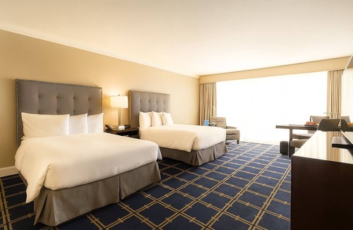 Sunnyvale West Hotel | Deluxe 2 Queens at The Grand Hotel, Onsite Pool, Pets Allowed, Free Parking