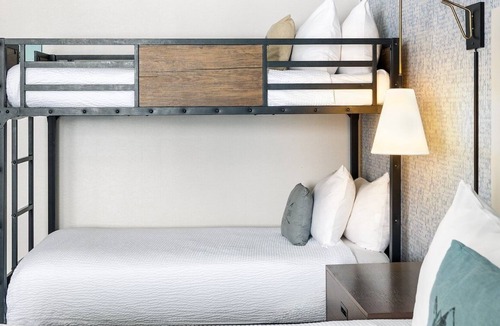 Steamboat Springs Hotel | Deluxe King + Twin Bunks at Gravity Haus Steamboat, Heated Outdoor Pool