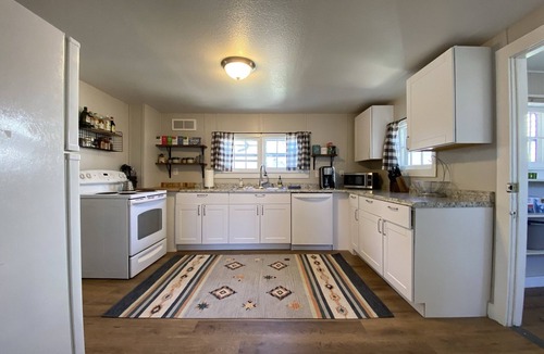 Historic Fort Collins High School Cottage | Dog Friendly with Private Fenced Yard, close to CSU and Old Town