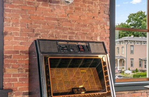 Canal Fulton Apartment | Downtown Brick Loft Above The Exchange Coffee Co