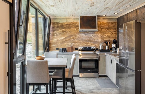 Nederland House | Earth-Built Cabin with Pine Shadows and a Tub That Waits
