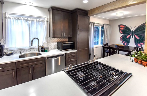 Southeast House | Enchanting Upper Unit with Whimsical Details