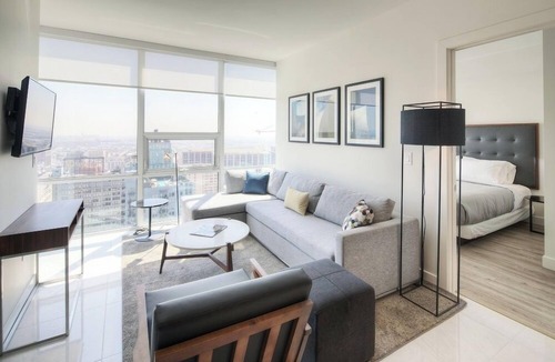 Downtown Los Angeles Apartment | Enjoy city views with one king bed and one queen bed and two bathrooms.