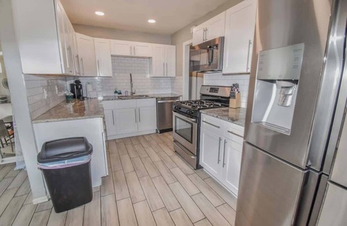 Southeast House | Family Home with Large Yard & Golf Theme Near Rail
