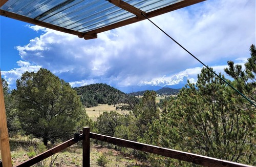 Canon City Cabin | Great views with relaxing deck.