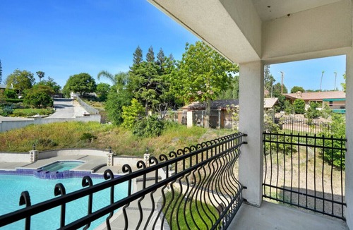 Covina House | Hillside Pool Haven: 6 bedrooms, with fitness area, and wide backyard
