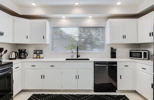 Downtown Hollywood House | Historic bungalow, heated pool, cabana, arcade, on park, beach 5 min, dogs ok.