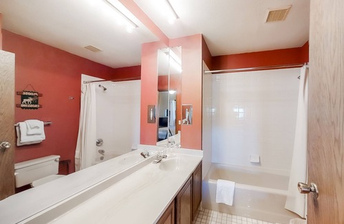 Silvercreek Condo | Inviting condo with outdoor heated pool, private hot tub, fireplace & W/D access