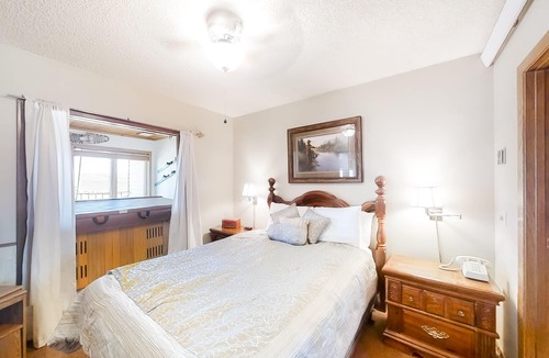 Silvercreek Condo | Inviting condo with outdoor heated pool, private hot tub, fireplace & W/D access