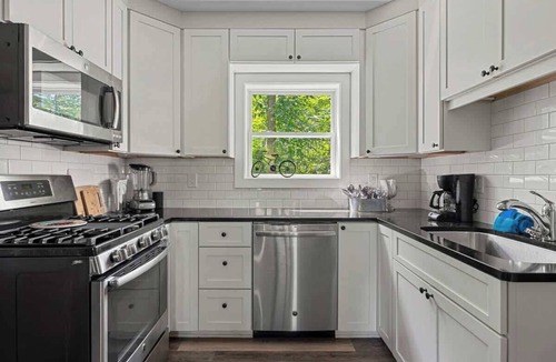 Lakeside House | Juniper Presents: Classic Cottage w Hot Tub, Steps from the Beach