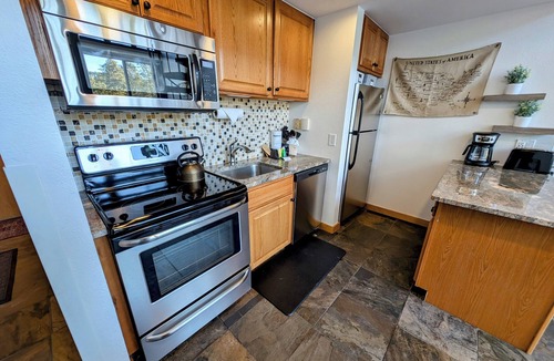 Lakeside Village Condo | Keystone Lake Stay | Hike, Bike & Relax