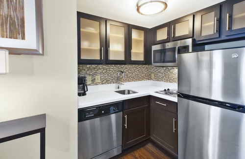 Mayfield Heights Condo | King Suite with a Jacuzzi Tub | 24-Hour Business Center, Fitness Center + Free Daily Breakfast