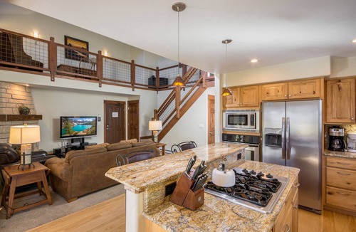 Steamboat Springs Condo | Large Covered Deck with Grill - Walk to shops & dining - easy parking - Comm Hot Tubs