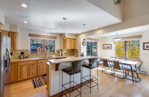 Steamboat Springs Condo | Large Covered Deck with Grill - Walk to shops & dining - easy parking - Comm Hot Tubs