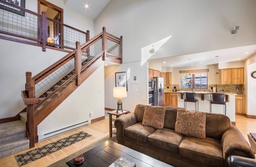 Steamboat Springs Condo | Large Covered Deck with Grill - Walk to shops & dining - easy parking - Comm Hot Tubs